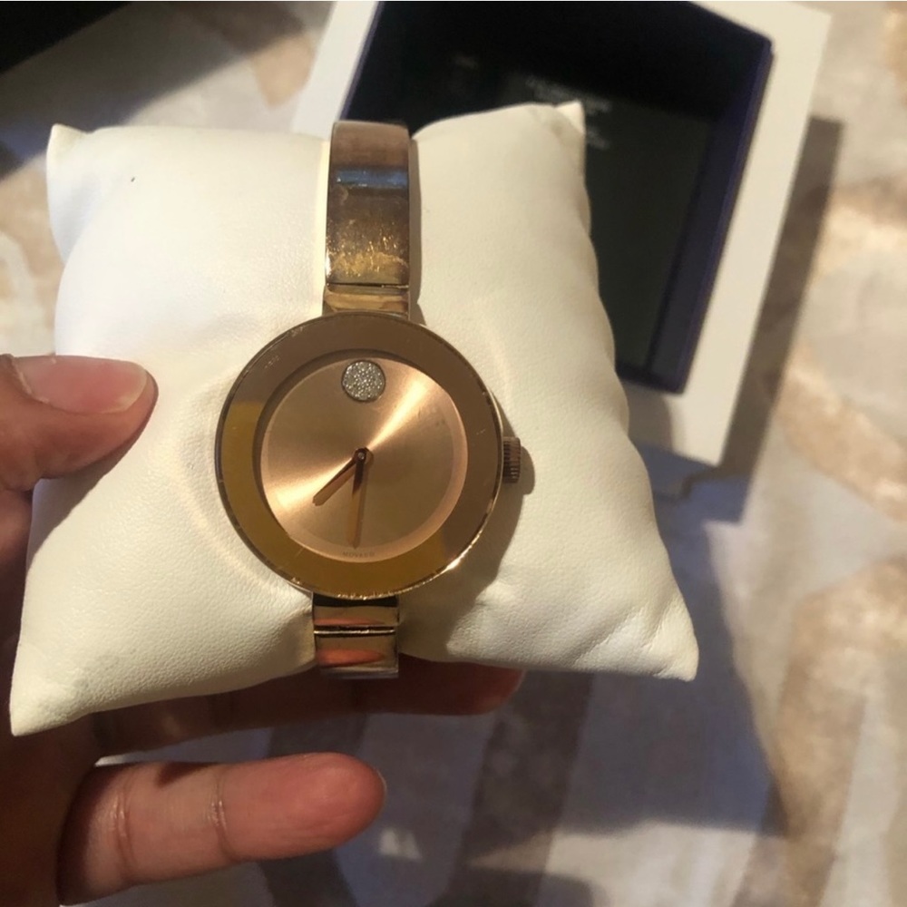 Used Movado watch with some tarnishing on band but over all in good condition